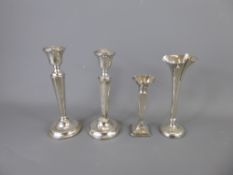 A Pair of Silver Candlesticks, Birmingham hallmark, dated 1925, mm Marson & Jones together with