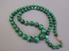 A Graduated Malachite and Green Glass Beaded Necklace, approx 70 cms.