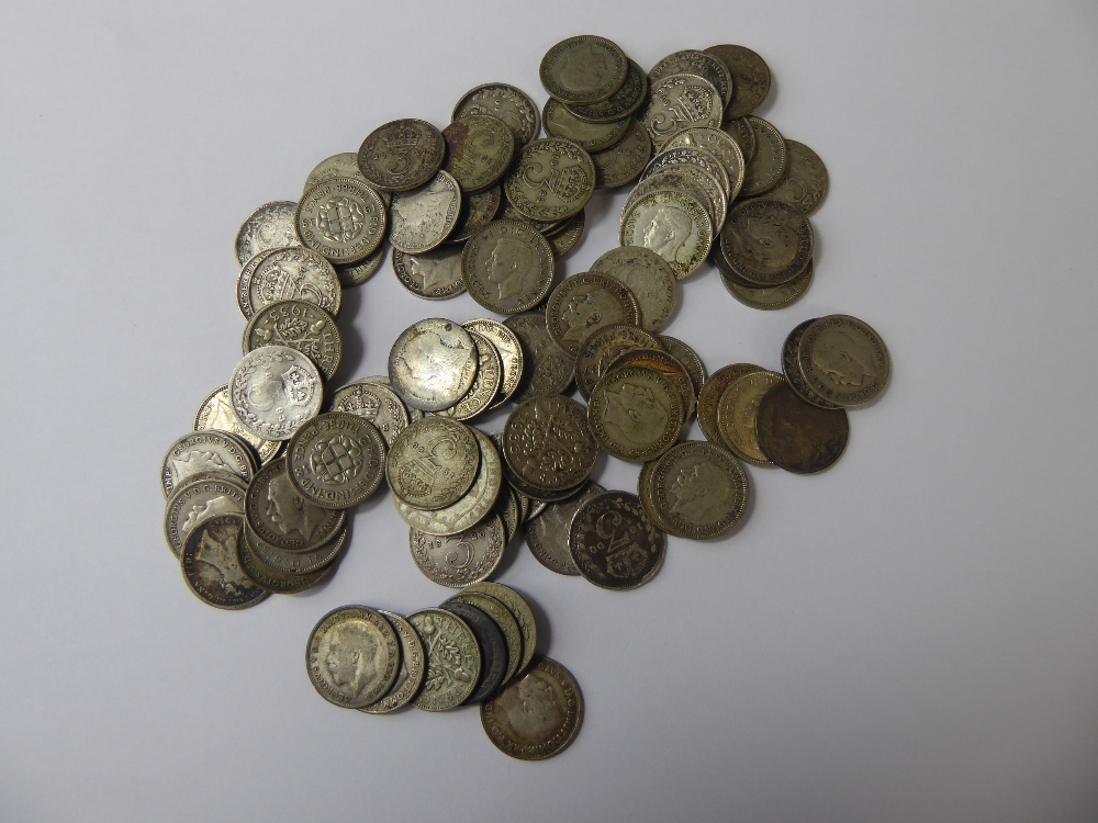 A Quantity of Three Pence Pieces, approx 129.5 gms.
