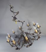 A Pair of Patinated Metal Ten Branch Chandeliers, with foliate decoration, wired but untested,