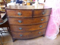 An Antique Mahogany Chest of Drawers, bow fronted with two short and three graduated long drawers,
