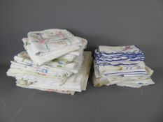 Miscellaneous Embroidered Linen, including two table cloths each with eight napkins, twenty one