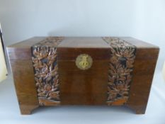 A Vintage Camphor Wood Blanket Box, with carved floral panels, approx 102 x 50 x 56 cms.