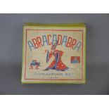 A Vintage German 'Abracadabra' Conjuring Set, with contents and instruction booklet.