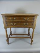 An Antique Oak Canteen Cutlery Side Table, with two long drawers, turned legs and stretchers, approx