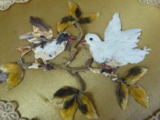 Two Antique Silk and Lace-Edged Hand Screens decorated with applied feather-work birds on branches