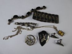 A Quantity of Silver Thai Jewellery, including earrings, brooch, two bracelets and a black stone