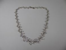 A Silver and CZ Crystal Branch Necklace, approx 41 cms.