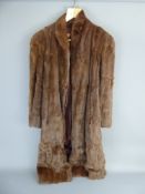 A Three-Quarter-Length Chestnut Mink Coat, medium size.