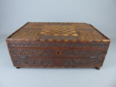 A 19th Century Persian Qajar Games Compendium, the box with delicate carving depicting birds and