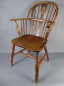 An Antique Windsor-Style Chair, with bent-wood elbow rests.