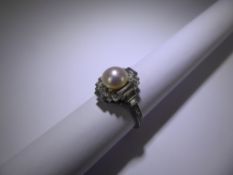 An Exquisite Art Deco Natural Saltwater Pearl, Platinum and Diamond Ring, the finely crafted ring