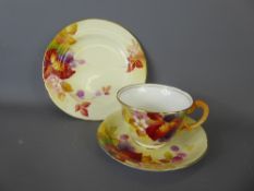 Royal Worcester Breakfast Set, comprising cup, saucer and plate, hand painted by Kitty Blake,