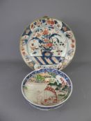 An Early 19th Century Imari Plate, approx 27 cms diameter, together with an oriental bowl, hand