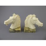 A Pair of Ceramic Italian Horse-head Book Ends on marble bases, approx 16 cms high.