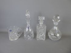 Three Cut Glass Decanters and Stoppers, including two Thomas Webb and one Parka Crystal, together