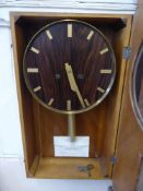 An Art Deco Rosewood and Oak Wall Clock, baton numerals, complete with key, approx 32 x 55 cms