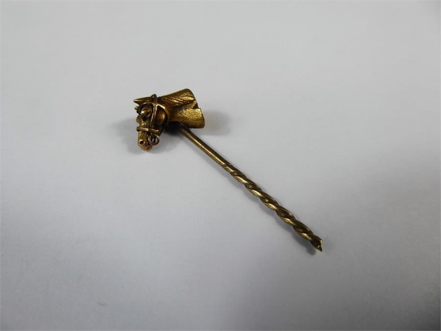A 9ct Gold Stock Pin.