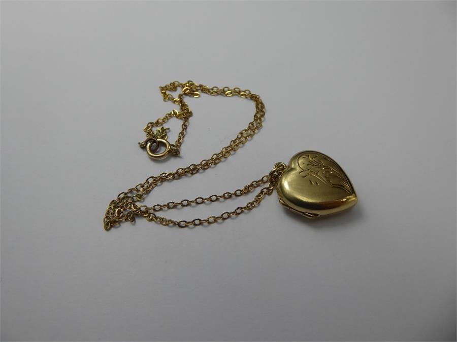 A 9ct Yellow Gold Locket and Chain.