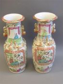 A Pair of Cantonese Famille Rose Vases.