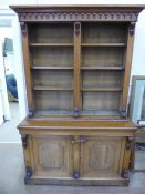 An Antique Oak Book Case.