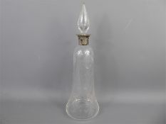 An Antique Cut Glass Silver Collared Decanter.