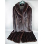 A Lady's Revillon Black Mink Cloak.