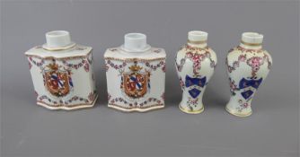 A Pair of Antique Continental Canisters, hand painted with floral garlands and coat of arms,