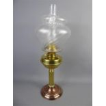 A Brass and Opaque Glass Oil Lamp.