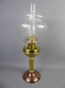 A Brass and Opaque Glass Oil Lamp.