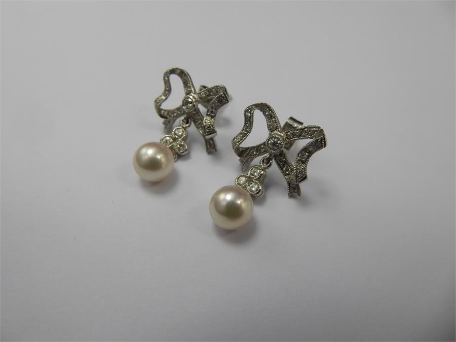 Mappin & Webb Pair of 18ct White Gold Earrings.