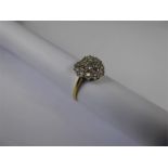 An 18ct Yellow and White Heart-Shape Gold Diamond Ring.