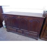 An Antique Stained Oak Mule Chest.