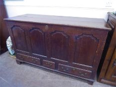 An Antique Stained Oak Mule Chest.