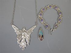 A Silver Art Nouveau Fairy Pendant.