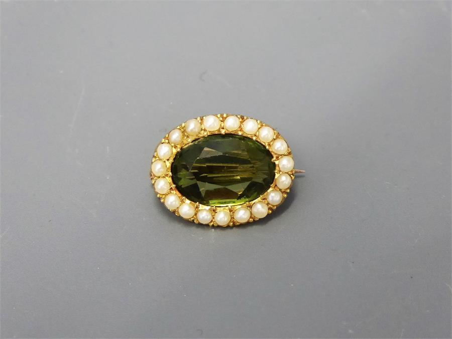 An Antique 9ct Gold Tourmaline and Seed Pearl Brooch.