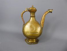 An 18th Century Mughal Brass Ewer.