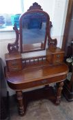 An Antique Mahogany Duchess Dresser.