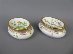 A Pair of Royal Copenhagen Flora Danica Oval Paperweights.