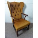 An Antique Mahogany Studded High Back Elbow Chair.