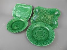 A Quantity of Green Wedgwood Majolica Plates, comprising six cabbage, two rectangular lily pad, four