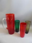 A Tall Vintage Red Glass Jug