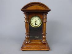 A Mahogany-Cased Mantel Clock