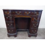 An Oak Serpentine Fronted Desk,