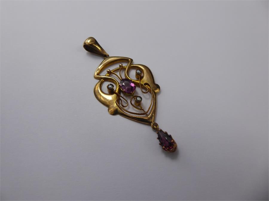 An Art Nouveau 14ct Tourmaline & Pearl Pendant.