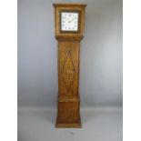 An Oak Cased Art Deco Clock.