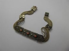 A Lady's Silver and Coral Bracelet