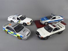 A Quantity of Die-cast 1:18 Police Cars