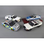 A Quantity of Die-cast 1:18 Police Cars