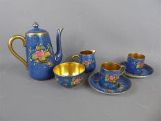 A Crown Staffordshire Hand-Painted Coffee Service